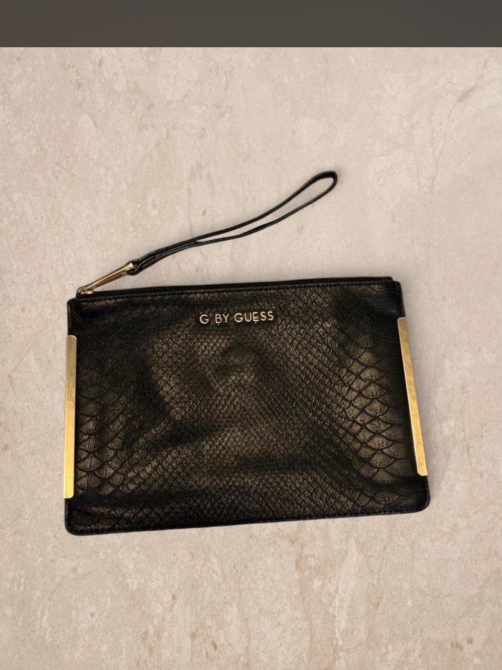 G by Guess Black Snake-Embossed Wristlet with Gold Accents